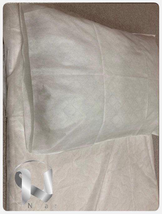 ملحفه و روبالشی یکبار مصرف هتلی